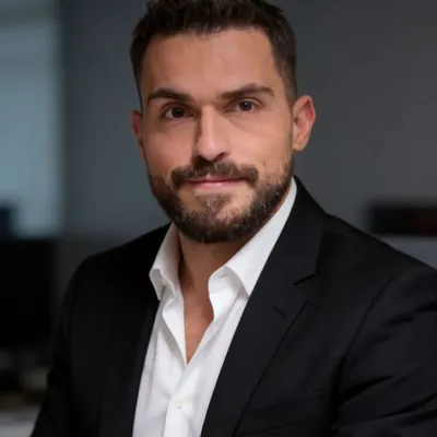 Albert Elshani, founder TrainWithAlbert who automated customer service with Eteya